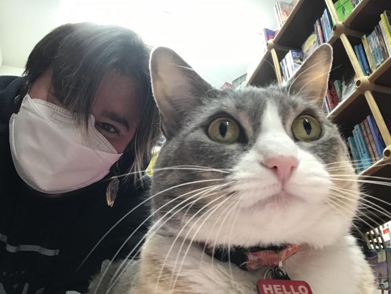 Apollo and Pippi having out together among the books